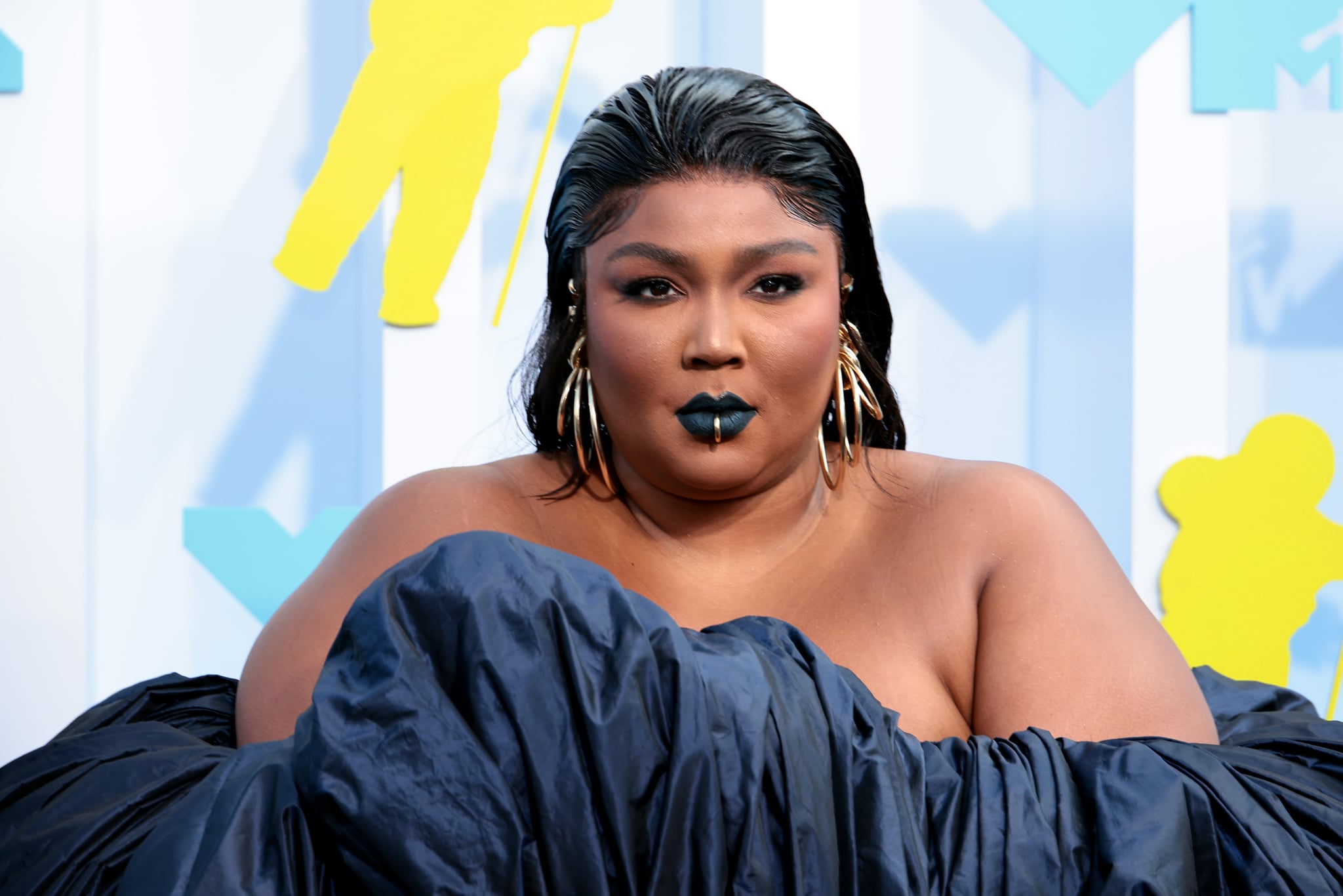 NEWARK, NEW JERSEY - AUGUST 28: Lizzo attends the 2022 MTV VMAs at Prudential Centre on August 28, 2022 in Newark, New Jersey. (Photo by Dimitrios Kambouris/Getty Images for MTV/Paramount Global)