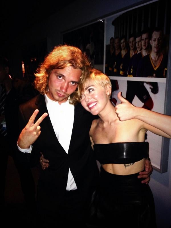 Miley Cyrus got emotional during her pal Jesse's heartfelt speech, but she was all smiles with him backstage.