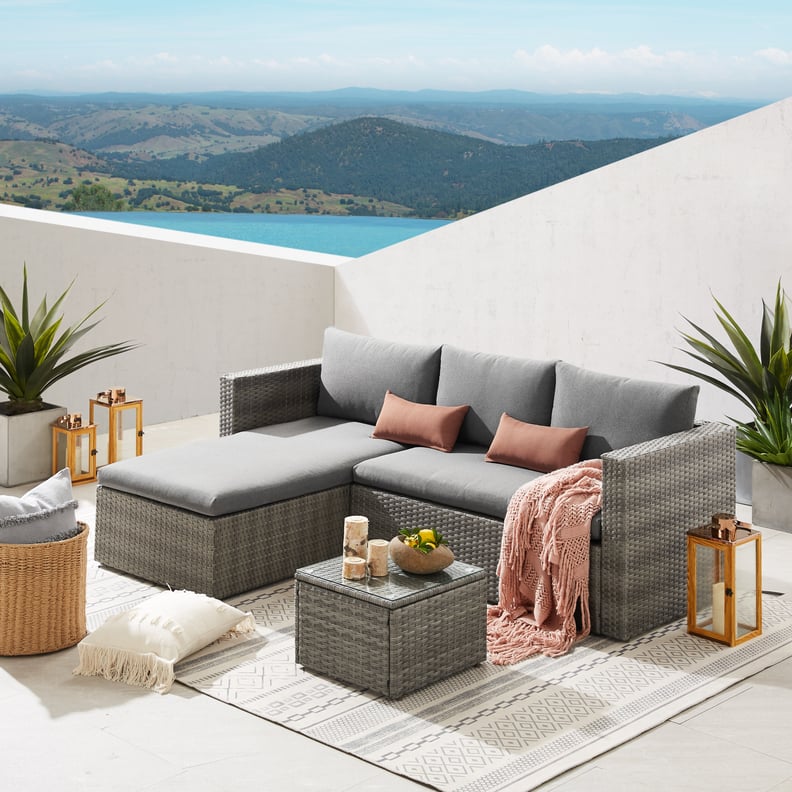 A Corner Sectional: Sievers Rattan Sectional Seating Group With Cushion