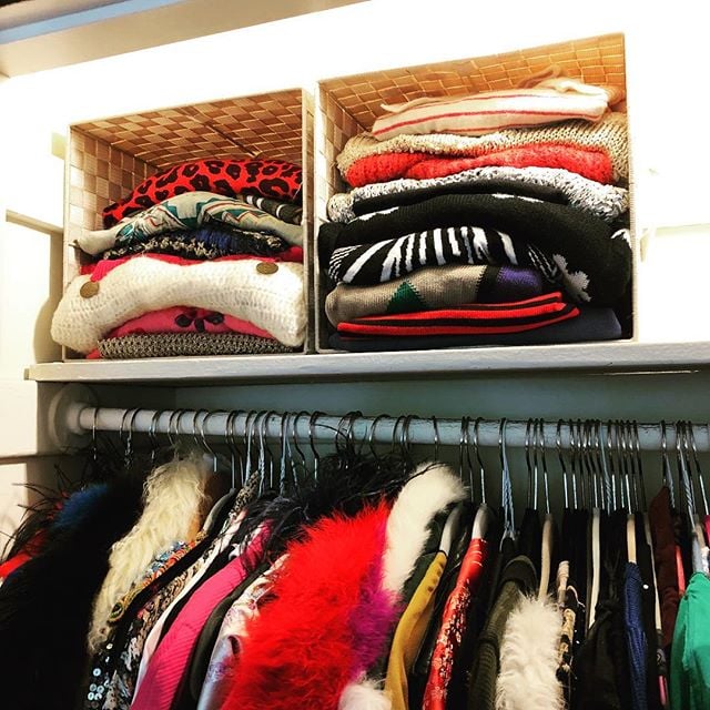 Use the top shelf of your closet to store bins and boxes full of