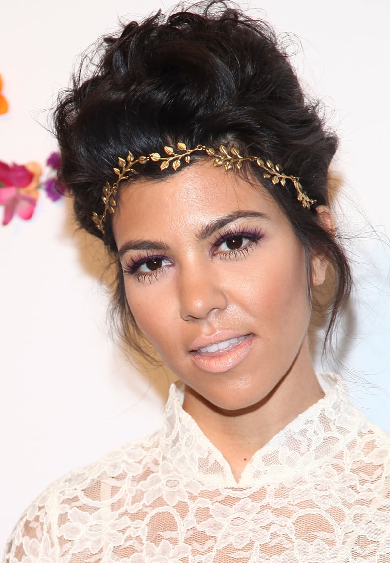 Kourtney Kardashian With an Updo and Gold Hair Accessory 2012