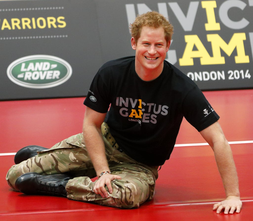 Prince Harry played sitting volleyball with injured servicemen and women while introducing his Invictus Games in London on Wednesday.