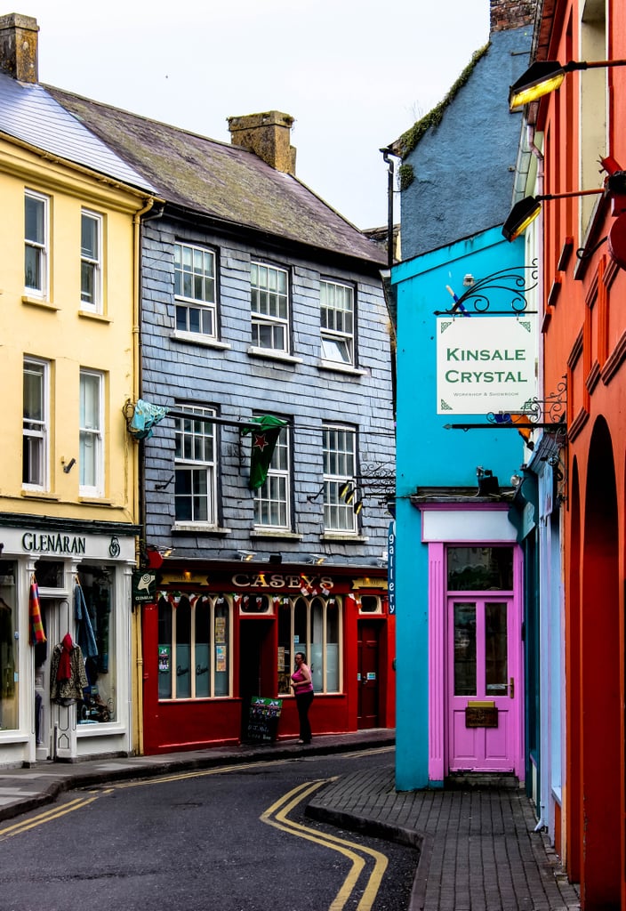 What made me instantly captivated by the town of Kinsale was its beautiful setting. Perched high atop a sparkling waterfront, it was practically begging to be explored. Just when I thought it couldn't get any cuter, I stepped foot onto the narrow winding streets lined with brightly painted shops and cafes and fell even more in love.  
Another tip for discovering the best of Kinsale? Make sure to bring along your appetite. Often referred to as "The Gourmet Capital of Ireland," this bustling village is packed to the brim with delicious pubs and restaurants.