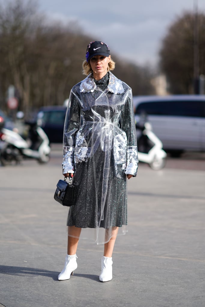 Wear Your Dress With a Baseball Hat, Plastic Coat, and White Boots