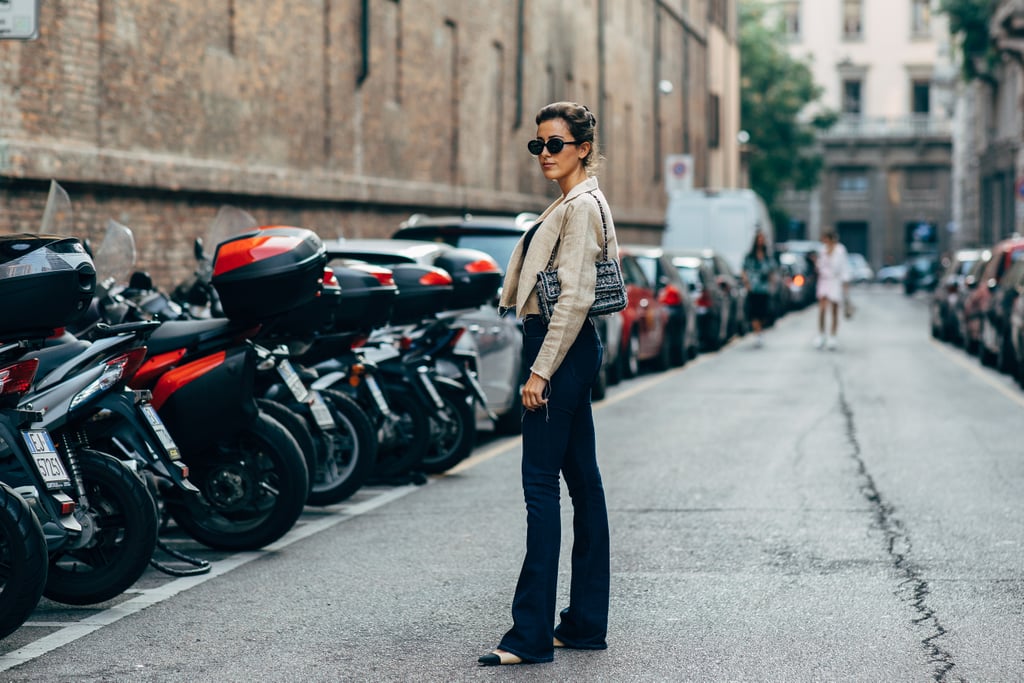 Wear cap-toe ballet flats with pooling flares. It's an unexpected shoe choice, but looks adorable with some cropped outerwear.