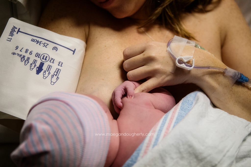 Mom Breastfeeding Toddler While in Labor