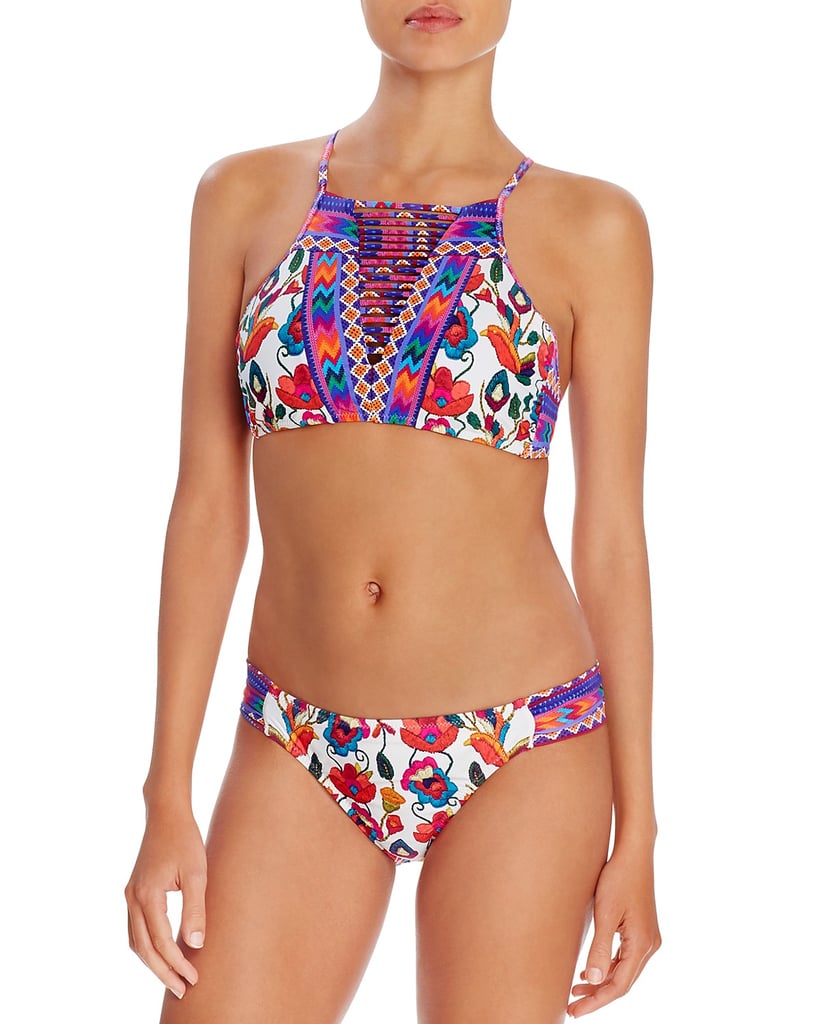 Pattern mixing definitely isn't taboo anymore, but it's always eye-catching. Try it out with this Nanette Lepore Antigua Stargazer Embroidery Print Bikini Top ($100) and Bottoms ($72).