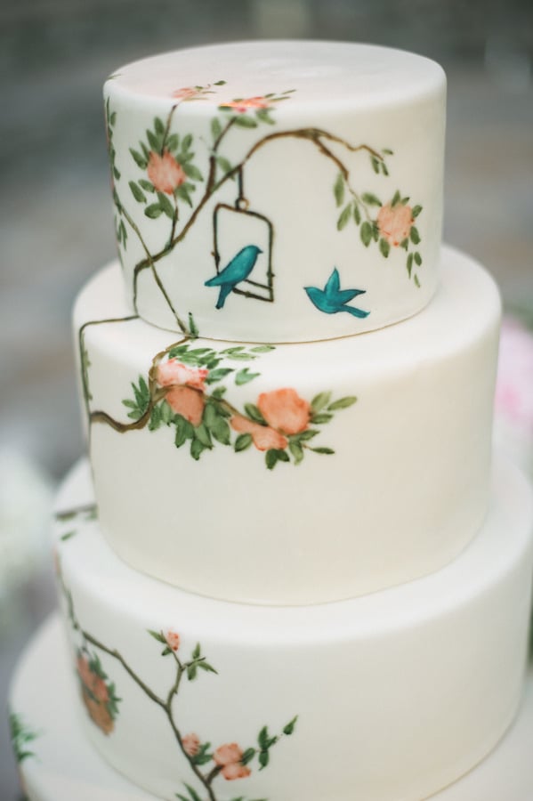 Painted wedding cakes are inherently special, and we think this particular one with its bird and floral design is just fabulous. 
Photo by  Amy and Stuart Photography via Style Me Pretty