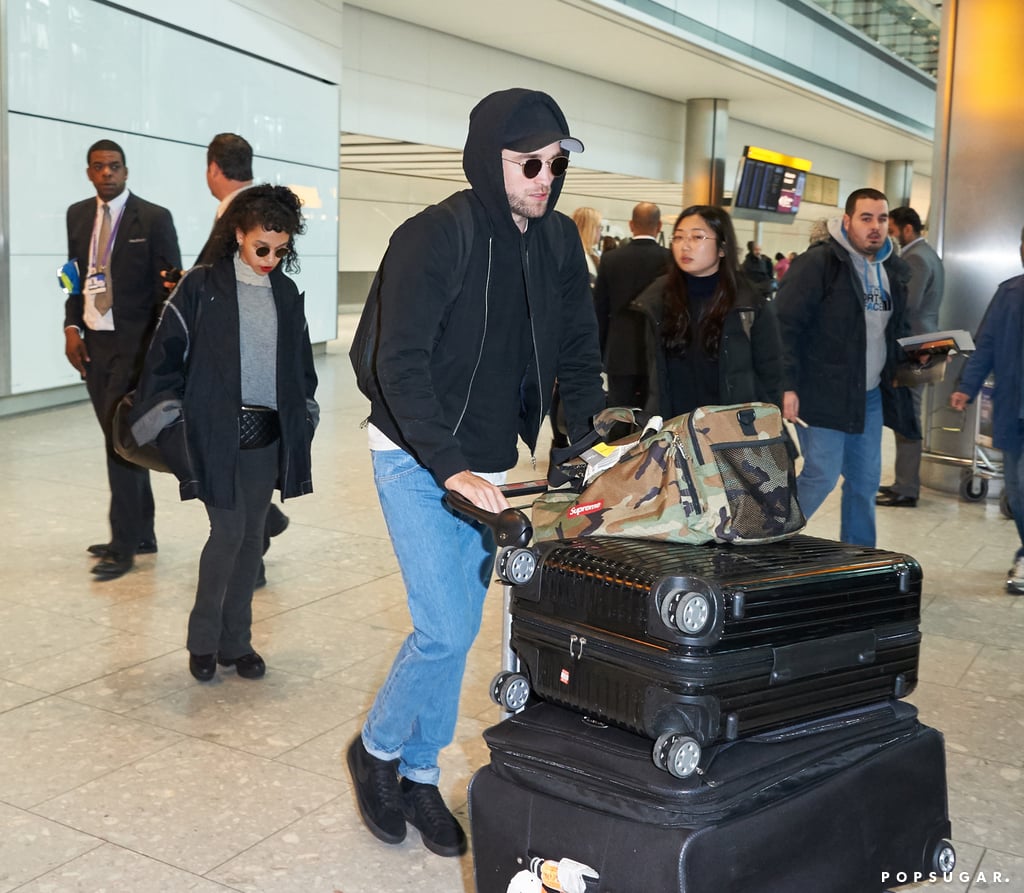 Robert Pattinson and FKA Twigs at LAX Airport November 2015