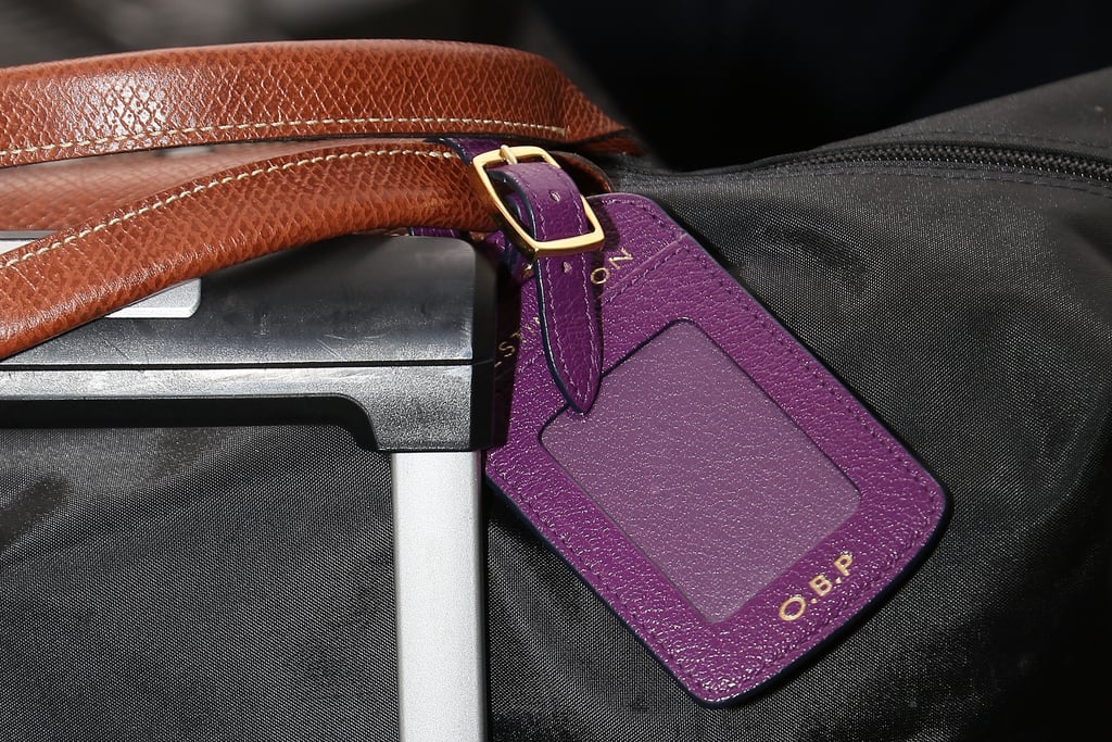 And of course, the style setter doesn't travel without monogrammed luggage tags.