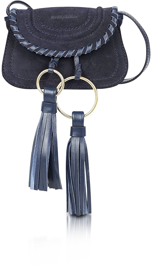 Channel the iconic bohemian vibes of the Chloé brand with this Polly Ultramarine suede and leather mini crossbody bag with tassels ($288).