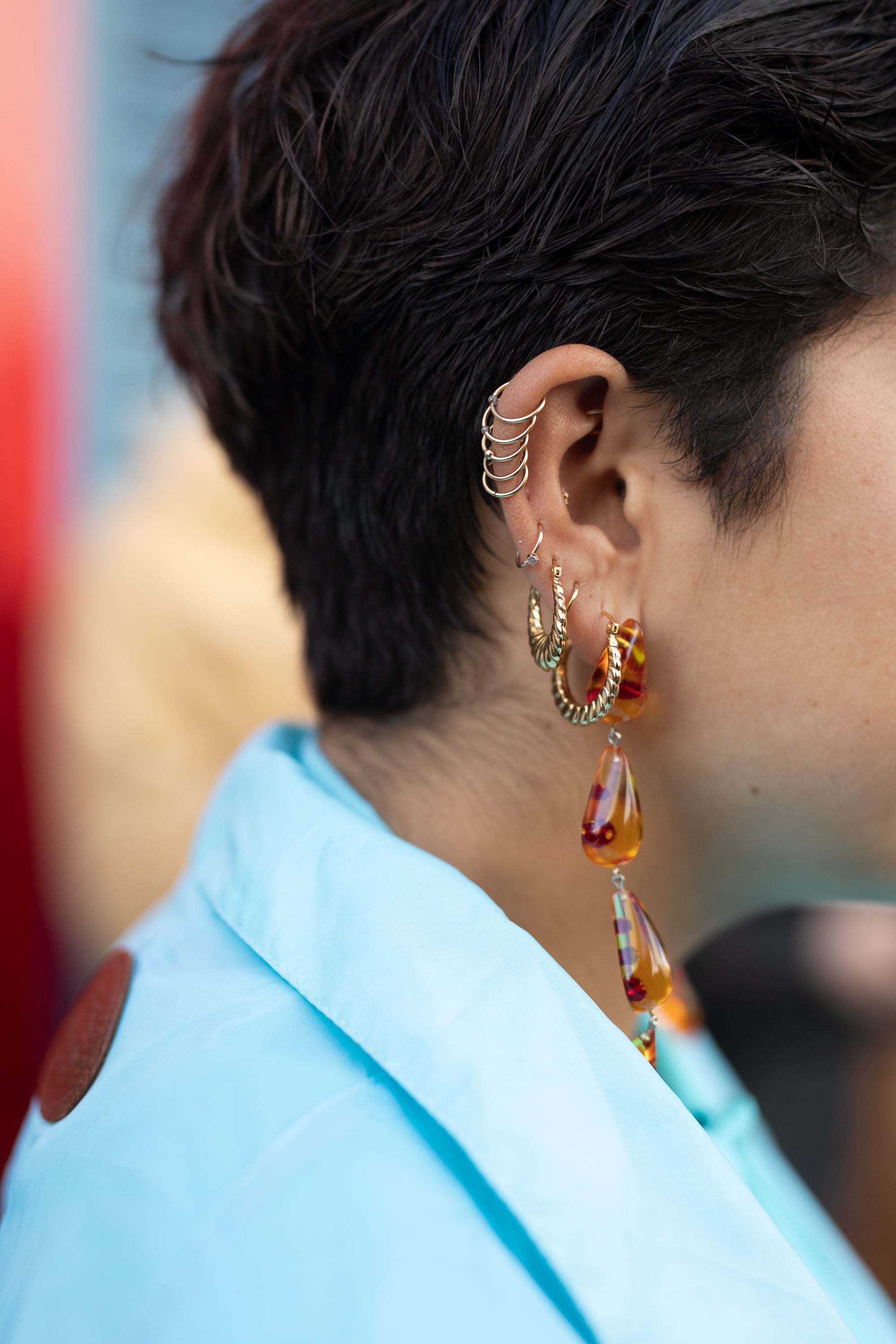 NEW YORK, NEW YORK - FEBRUARY 04: A guest is seen on the street during Men's New York Fashion Week wearing various earrings on February 04, 2019 in New York City. (Photo by Matthew Sperzel/Getty Images)