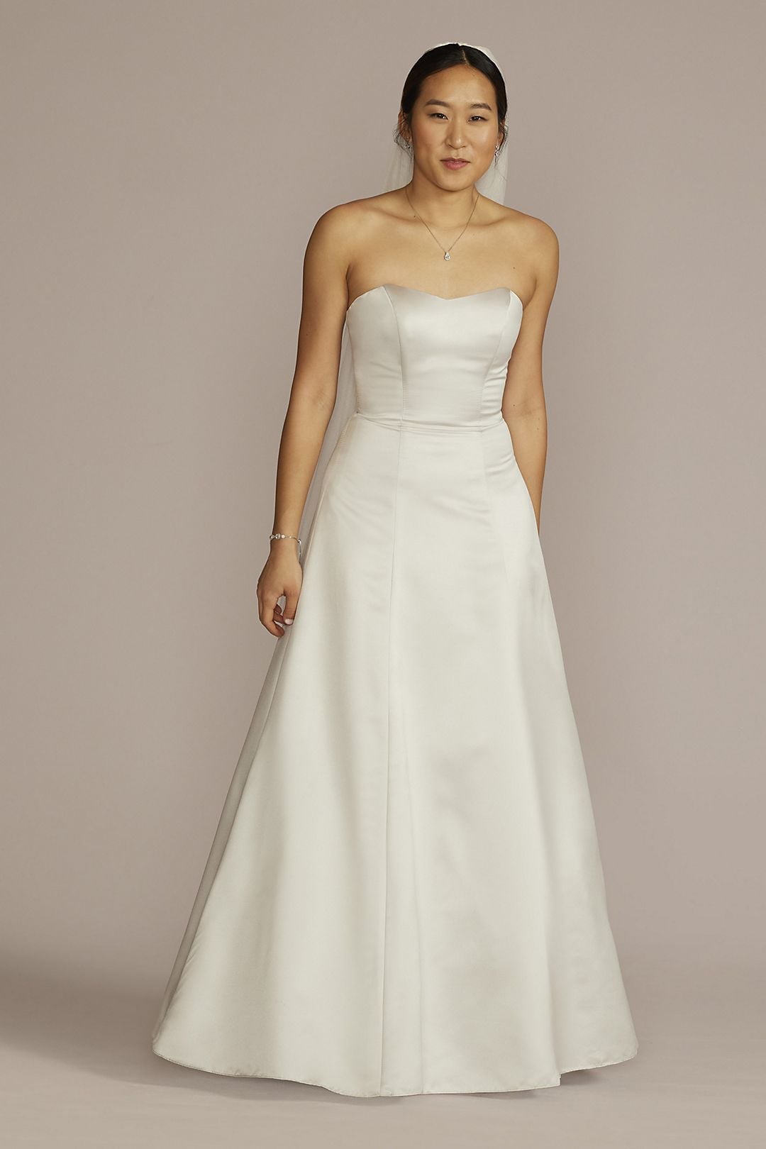 A Simple Modern Wedding Dress: David's Bridal Strapless A-Line Satin Wedding  Dress, 9 Modern Wedding Dresses For the Contemporary Bride