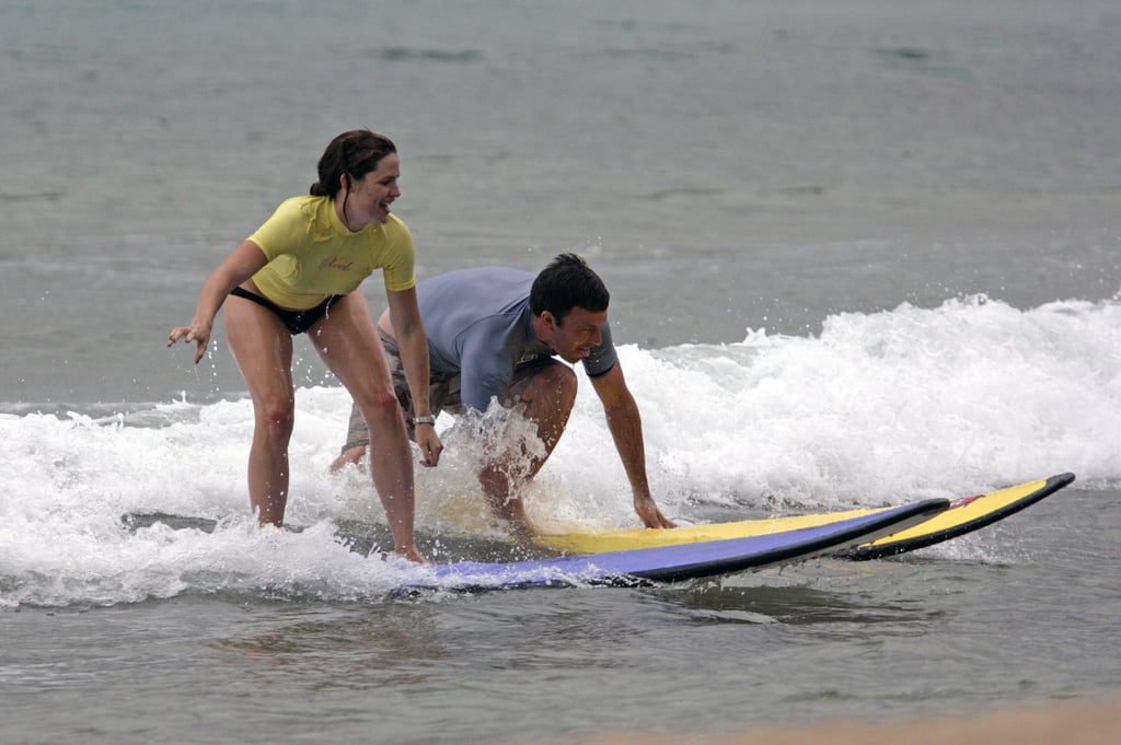 They surfed side by side during one of their Hawaiian vacations in June 2007.
