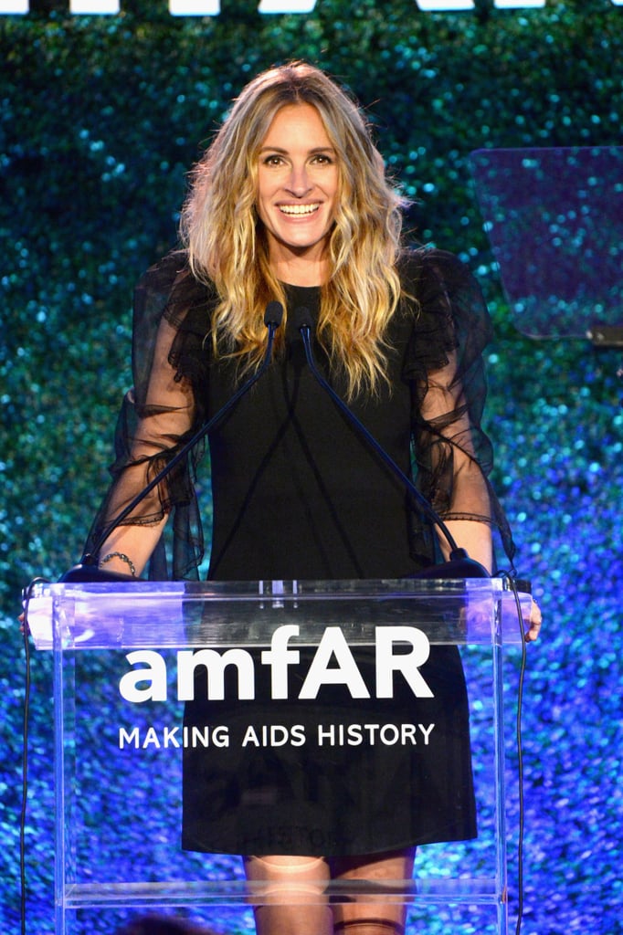 At the 2017 amfAR Gala, Julia gave a big grin while speaking on stage.