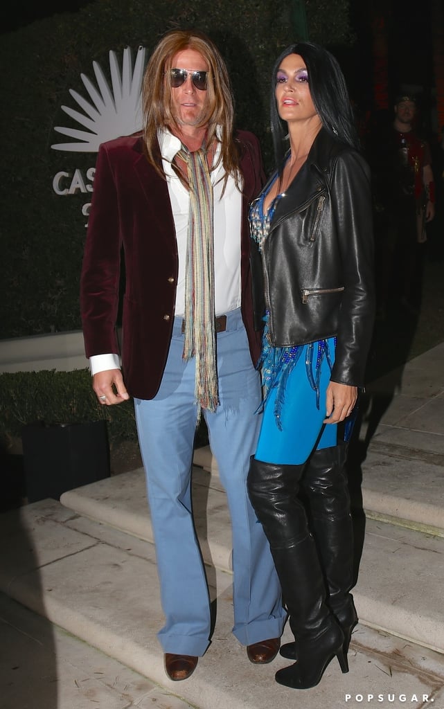 Hosts Rande Gerber and Cindy Crawford posed in their Gregg Allman and Cher costumes.