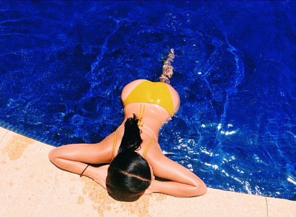 Kim Kardashian flaunted her backside while swimming in Mexico. 
Source: Instagram user kimkardashian