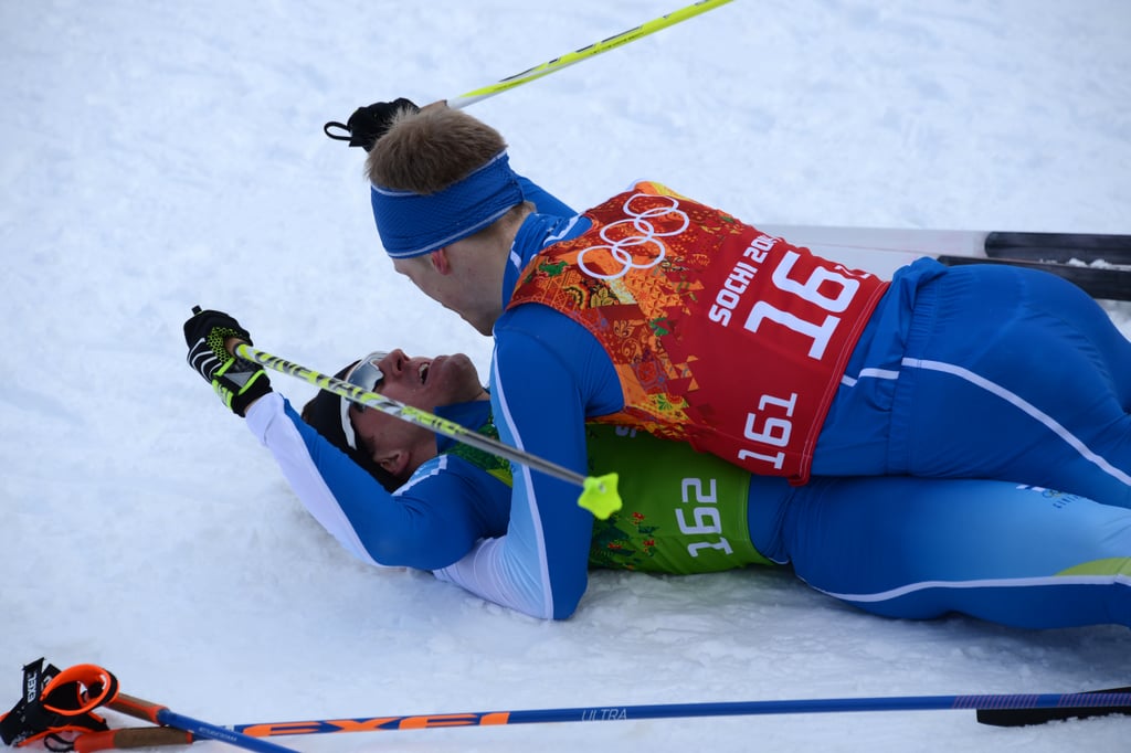Finland's Sami Jauhojärvi got smothered by a teammate after winning gold in the cross-country ski team sprint.