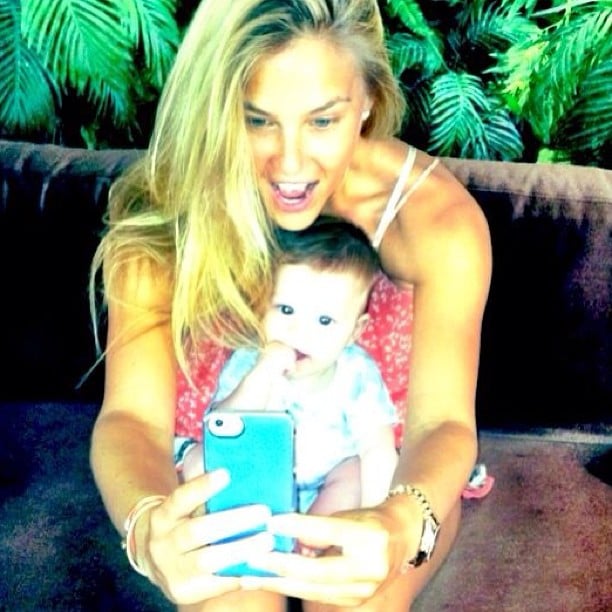 Bar Refaeli was happy to take a photo with a young friend in May 2013.

Source: Instagram user barrefaeli