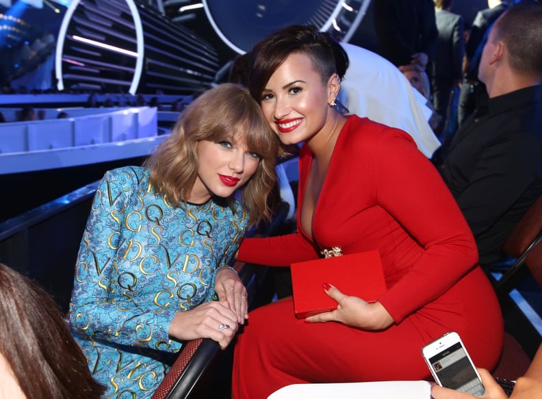 Taylor Swift and Demi Lovato at the 2014 VMAs