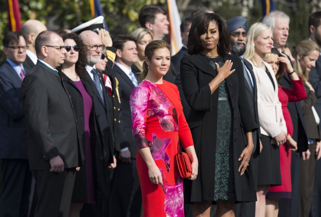 Topping things off with a black coat, Michelle nailed transitional style.