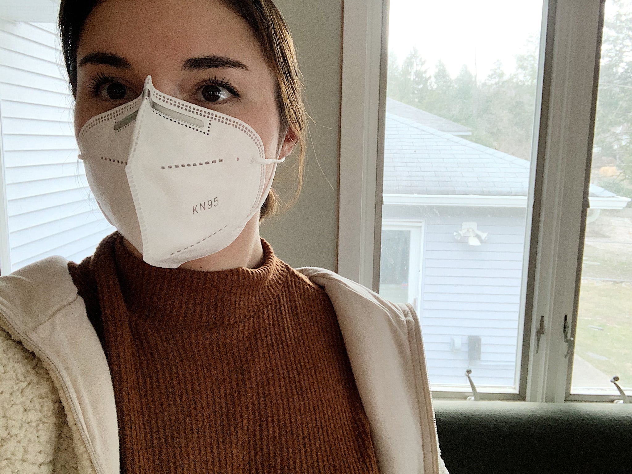 POPSUGAR editor wearing an KN95 mask