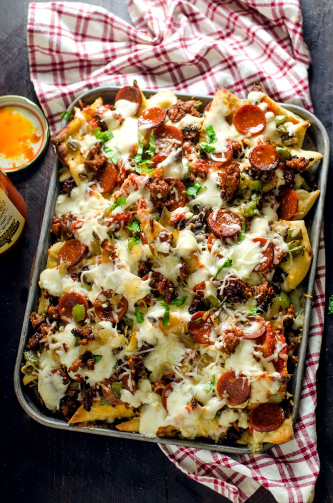 Loaded Pizza Nachos with Garlic White Sauce SheetPan Nacho Recipes