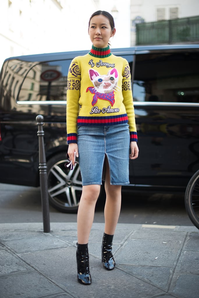 Michelle Jen Yeoh took on the Gucci cat graphic by pairing it with a denim skirt and black booties.