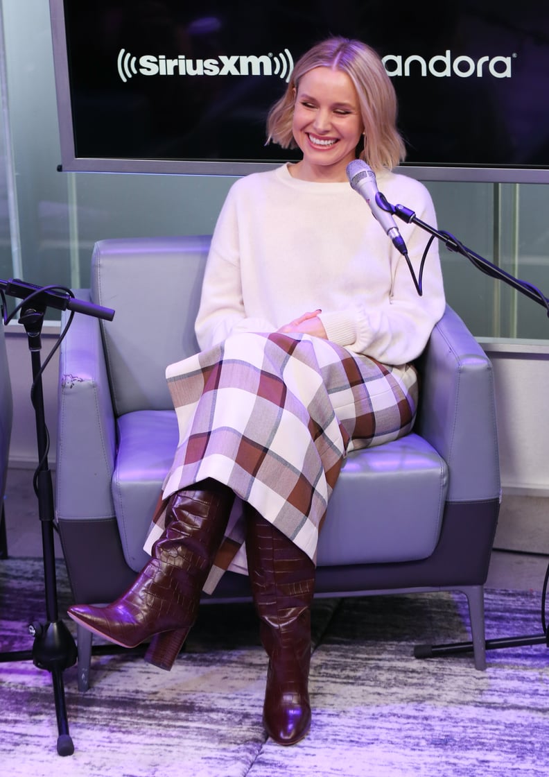 Kristen Bell Wears a Staud Skirt and Loeffler Randal Boots in NYC