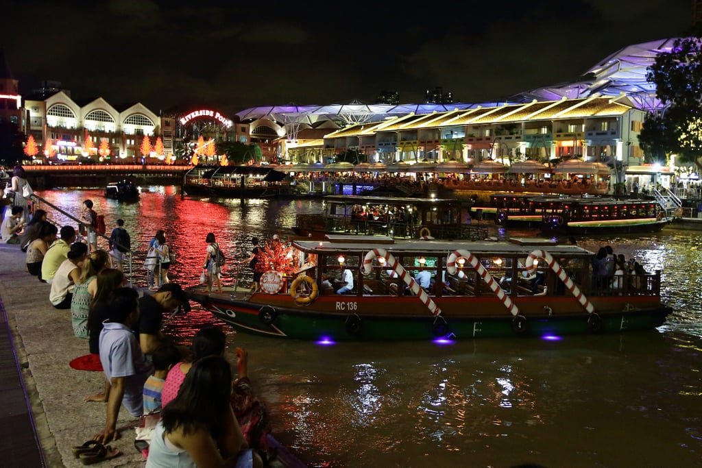In Singapore, the annual "Christmas by the River" festival featured boats covered in holiday decorations.