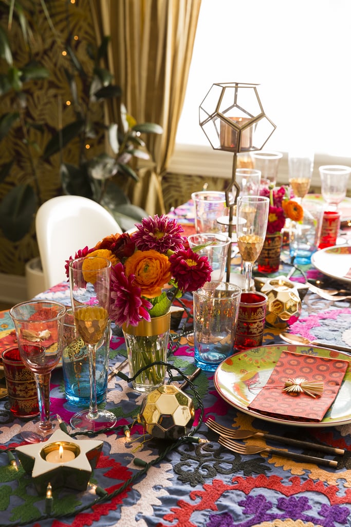 Justina said she wanted to infuse her tabletop with magic. "When I think of the holidays, I think of bright colors, shimmering lights, and warmth — that was the vibe I was calling to my holiday tabletop."