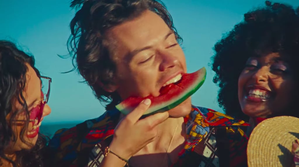 "First and foremost, how does one get cast in a Harry Styles music video? I mean, hand-feeding THE Harry Styles pieces of fruit on a beach whilst wearing nothing but a swimsuit is like the crème de la crème of casting opportunities here, people. Secondly, never in my life have I desired to be an inanimate object as much as I've desired to be the piece of watermelon Harry lovingly caresses and bites into in the first scene of the video. And last but most certainly not least, the fact that the entire video is 'dedicated to touching' is just *chef's kiss.*" — Victoria Messina, Trending and Viral Features Associate Editor