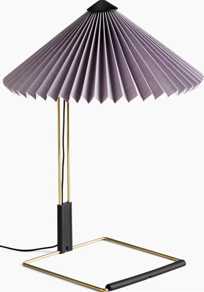 Herman Miller Matin Table Lamp ($184, originally $245)
I may be biased because I own two of these lamps, but I do think they are an easy way to elevate a space, and I love the dimmable feature. Fun fact: it was also the same lamp that Zendaya's character Emma had on her nightstand in "The Drama," so do with that information as you please.