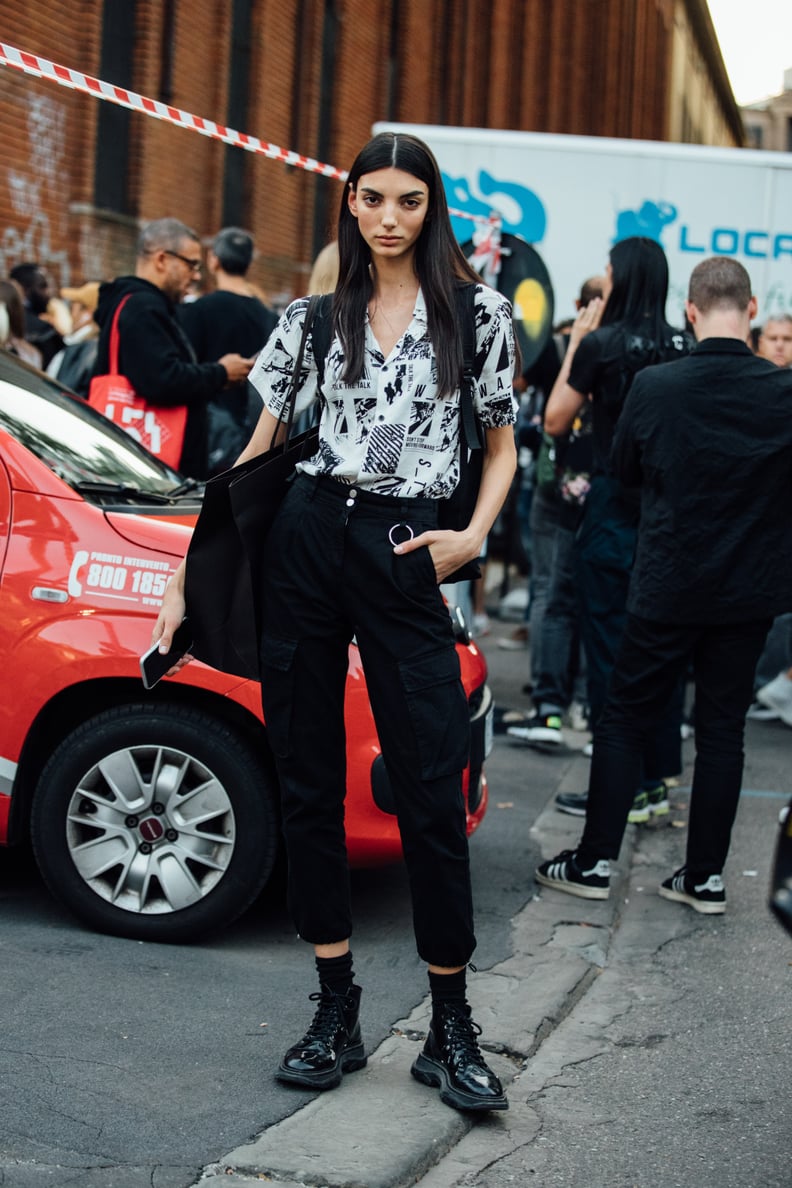 How to Style Black Cargo Pants and Not Look Like You're Stuck in the Past  Black  cargo pants outfit street style, Trendy black outfits, Cargo pants outfit  street style