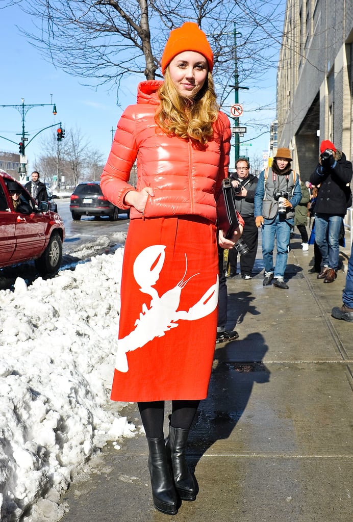 This orange-on-orange look is proof that even the practical puffer can be chic. Wear on the next snow day, and rejoice.