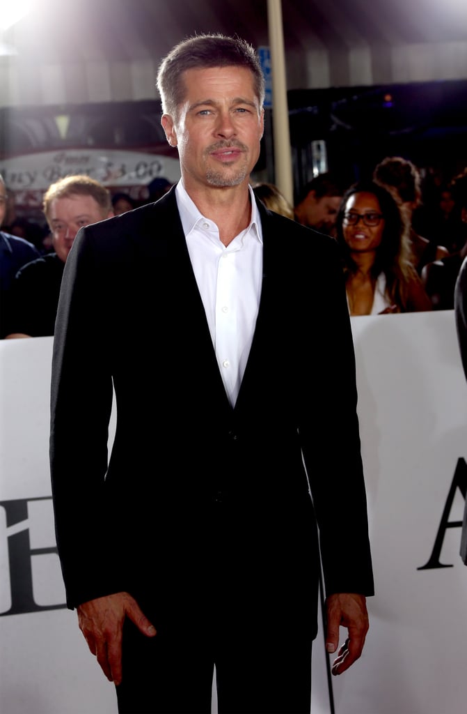 Brad Pitt appeared to be in good spirits when he stepped out for an Allied fan event in LA on Wednesday evening. The actor, who's been keeping a low profile as of late, looked dapper in a black suit as he posed for photos, signed autographs, and greeted fans. The event also brought out Brad's costar Marion Cotillard, who is currently pregnant with her second child with longtime partner Guillaume Canet. Marion first announced her pregnancy back in September after rumors began swirling that she and Brad were having an affair. 
The event marked Brad's first red carpet appearance since Angelina Jolie filed for divorce from him in September, though he did attend a private screening of Moonlight with Julia Roberts on Tuesday night. Since the breakup, so much has happened between the former couple that their cute moments now seem like a distant memory. Although Angelina has yet to personally speak out on the matter, her attorney, Robert Offer, said her decision to split was "for the health of the family." Brad also released a statement of his own, telling People, "I am very saddened by this, but what matters most now is the well-being of our kids." Earlier in the day, law enforcement sources confirmed to Us Weekly that Brad has been cleared in a child abuse investigation involving his son Maddox. TMZ also reported that the Department of Children and Family Services ruled out any reports of any patterns of misconduct on the actor's part.

    Related:

            
            
                                    
                            

            46 Couples Who Have Called It Quits This Year