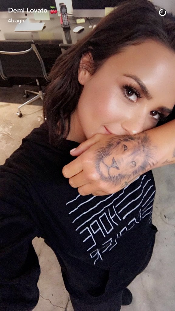 Demi's lion tattoo was done by famed artist, Bang Bang, the same guy behind her "now I'm a warrior" tattoo. It is said to symbolize her zodiac sign, Leo, and a reference to her song "Lionheart," which talks about finding strength through love.