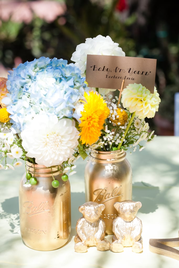 Did you take on any DIY projects?
"We went spray-paint crazy. Mason jars, table figurines, table name holders, you name it — I think Home Depot started to get suspicious. We also hand-drew hearts onto matchbooks and enlisted the bridal party to tie them to sparklers, which we placed at each table setting for guests to light later in the evening. Chanti designed the menus and itineraries, and we printed them out at FedEx, where we took advantage of the sheet cutter (not something I would recommend when you're short on time!).
For favors, we bought miniature packets, which we decorated with cute kitten stamps (we have a cat hashtag on Instagram, #danteandcomma, so it seemed appropriate). We filled them with flower seeds, wrote 'California Paw-pies' on the front, and sealed them with a Golden Gate bridge stamp on the back."
Photo by G Aranow Photography