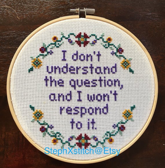 "I don't understand the question . . ." Cross-Stitch Hoop ($80)