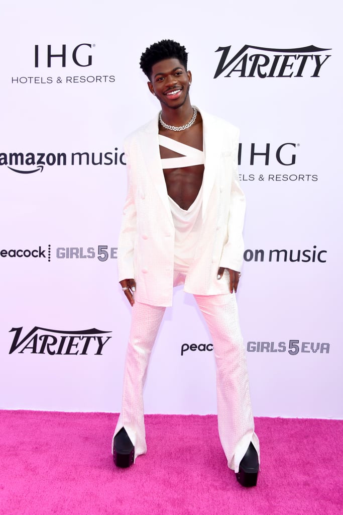 Lil Nas X Wears a White Balmain Pantsuit and Bandage Top