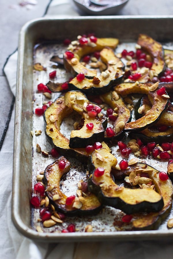 Roasted Acorn Squash With Toasted Hazelnuts, Pomegranate, and Squash Seeds