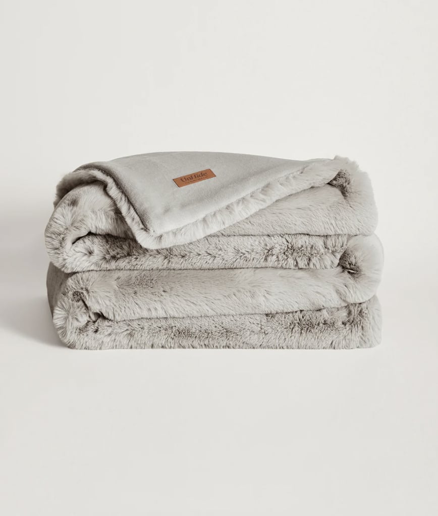 UnHide Marshmallow Blanket ($249)
"I've long struggled with anxiety and have often found respite in using this weighted blanket to calm my nerves and help me to feel more grounded. The blanket is made from a soft velvety fabric that's cool to the touch and feels oh so comforting against my skin. It's chunky, long-lasting, and the perfect cure for my silly (read: actually very dramatic) angst. 
Hell, even if I'm feeling lonely (a momentary side effect of living by myself), I can drape myself in this cozy beaut and at least pretend that I'm wrapped in the embrace of another person. It's like getting all the benefits of a warm hug and none of the annoyances of a partner. Talk about an all-in-one product!" — Kyley Warren, former assistant shopping editor