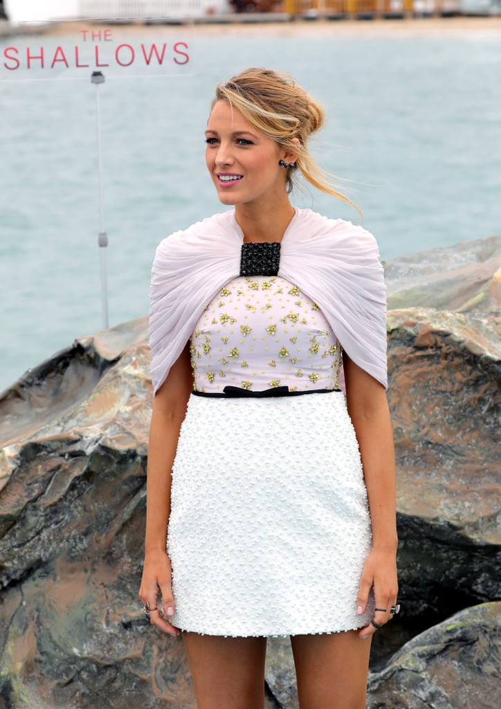 Blake Lively Wearing a Fashionable Wrap Over a Sexy Mini Dress