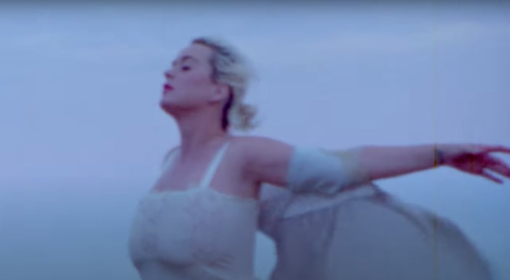 See Katy Perry's White Lace Dresses in "Daisies" Music Video