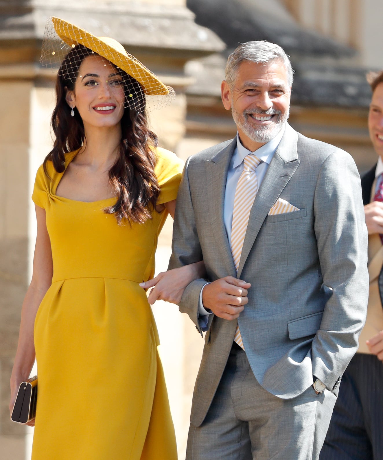 WINDSOR, UNITED KINGDOM - MAY 19: (EMBARGOED FOR PUBLICATION IN UK NEWSPAPERS UNTIL 24 HOURS AFTER CREATE DATE AND TIME) Amal Clooney and George Clooney attend the wedding of Prince Harry to Ms Meghan Markle at St George's Chapel, Windsor Castle on May 19, 2018 in Windsor, England. Prince Henry Charles Albert David of Wales marries Ms. Meghan Markle in a service at St George's Chapel inside the grounds of Windsor Castle. Among the guests were 2200 members of the public, the royal family and Ms. Markle's Mother Doria Ragland. (Photo by Max Mumby/Indigo/Getty Images)