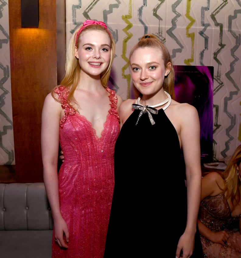 HOLLYWOOD, CALIFORNIA - APRIL 02: Elle Fanning (L) and Dakota Fanning pose at the after party for a special screening of Bleeker Street's 