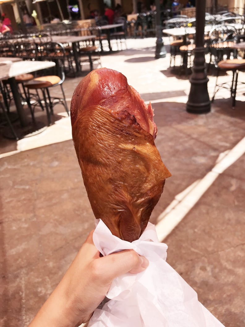 Nosh on a giant turkey leg at Frontierland.