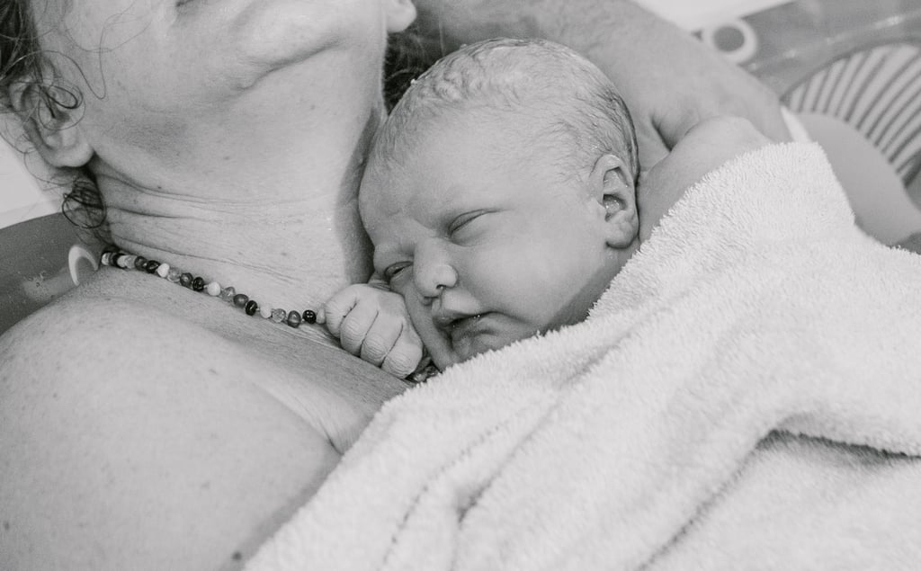 Mom Breastfeeding During Childbirth