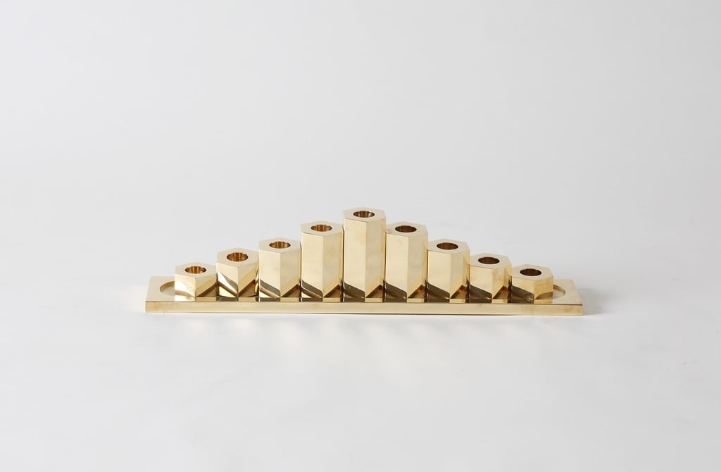 We appreciate the beauty of this March Polished Brass Menorah, but we can't palette the $2,500 price tag.  Gwyneth, however, feels otherwise.