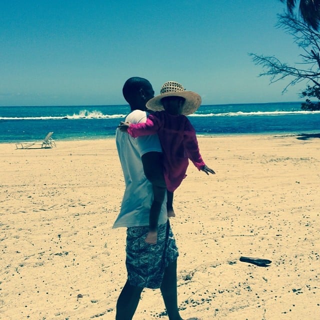 Beyoncé snapped this sweet shot of Jay Z and Blue Ivy strolling in the sand. 
Source: Instagram user beyonce